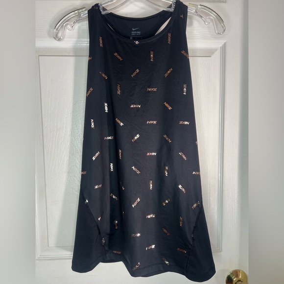 Nike Tops - nike pro dri fit Tank Top Women’s Large Rose Gold All Over Logo Racerback